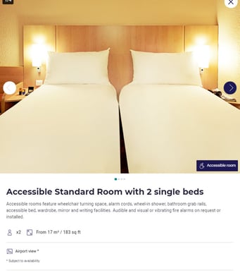 Ibis accessible room carousel image showing two single beds